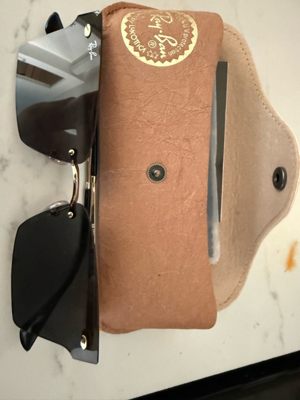 Ray-Ban Rimless Black Sunglasses with Gold Accents and Tan Case